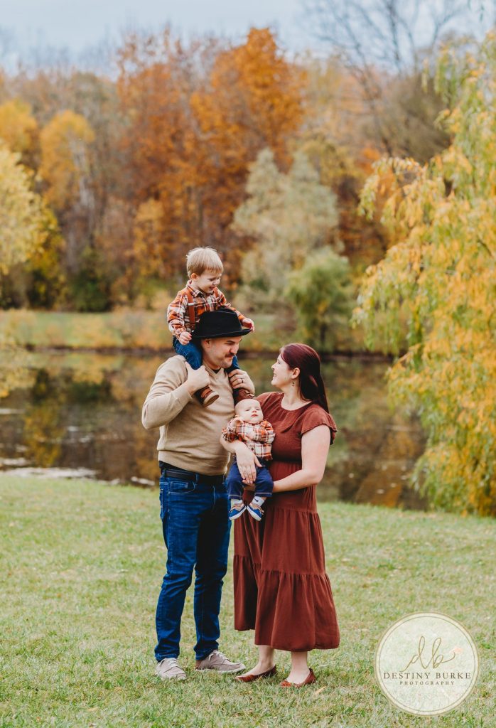 Best family photographer near Rochester, NY, family photography session in the fall, extended family portrait session in Chili, NY, family of four, Black Creek Park,