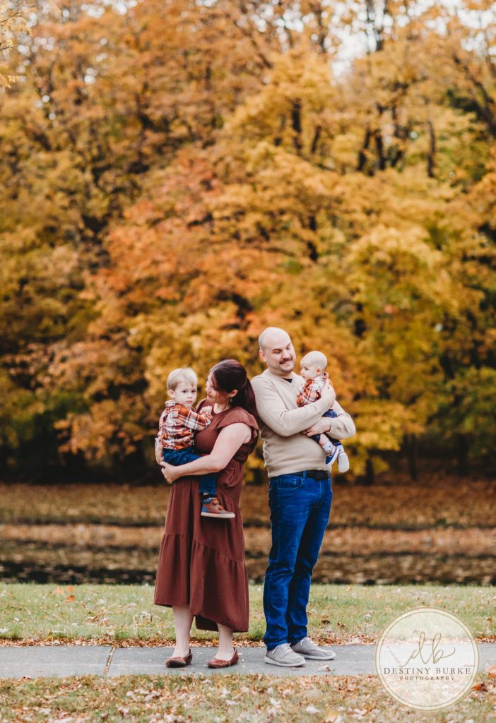 Best family photographer near Rochester, NY, family photography session in the fall, extended family portrait session in Chili, NY, family of four, Black Creek Park,