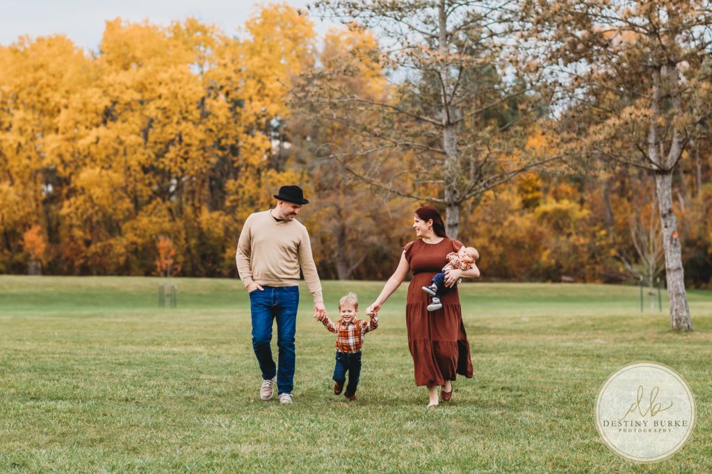 Best family photographer near Rochester, NY, family photography session in the fall, extended family portrait session in Chili, NY, family of four, Black Creek Park,