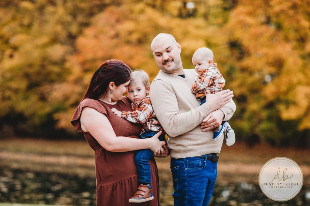 Best family photographer near Rochester, NY, family photography session in the fall, extended family portrait session in Chili, NY, family of four, Black Creek Park,