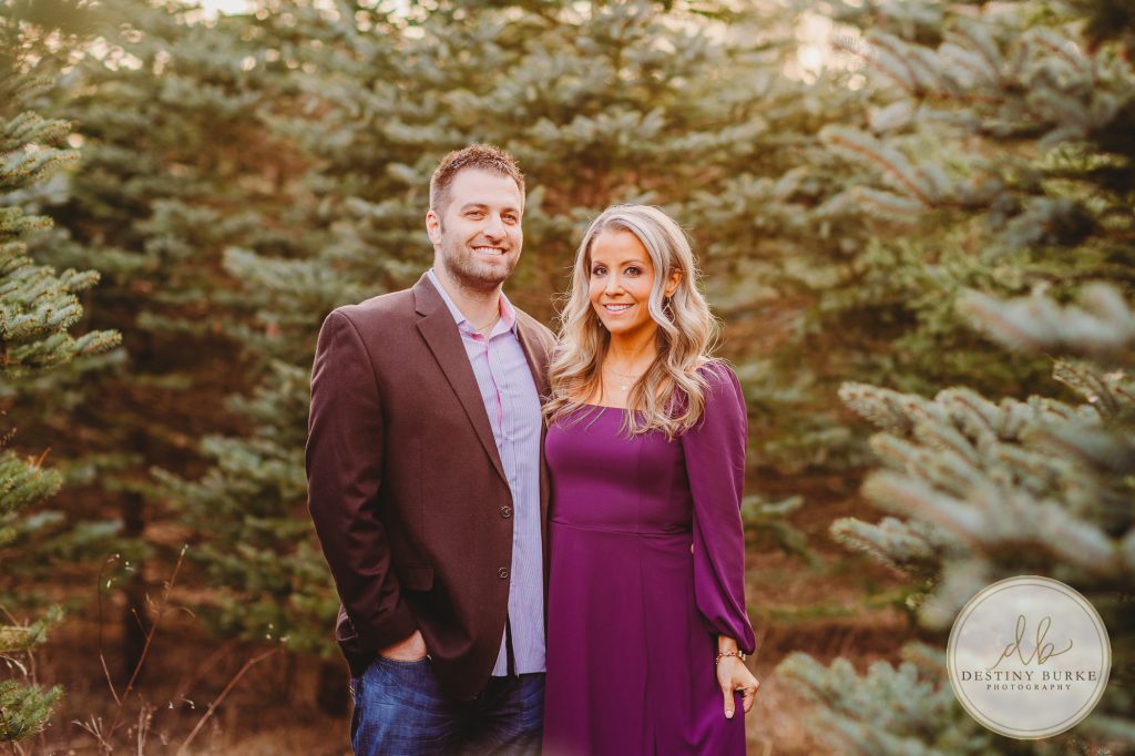 Husband and Wife Couples Photography Session at tree farm near Rochester, NY, in LeRoy at McPherson Orchards tree farm.