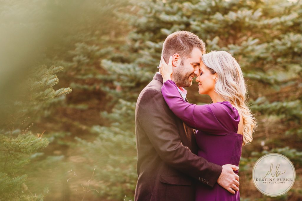 Husband and Wife Couples Photography Session at tree farm near Rochester, NY, in LeRoy at McPherson Orchards tree farm.
