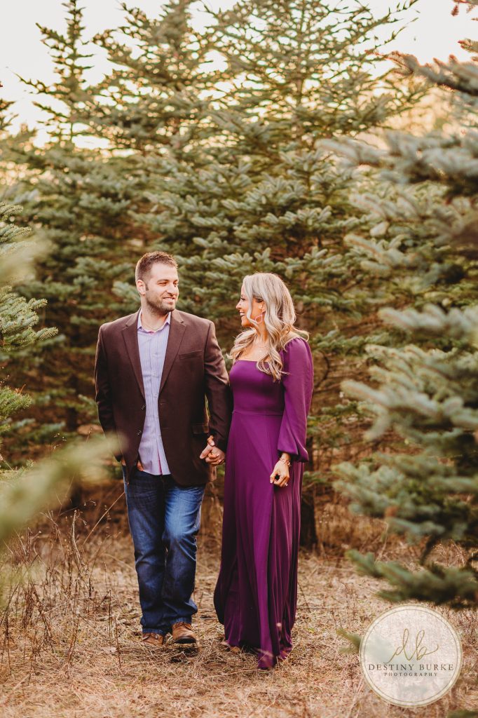 Husband and Wife Couples Photography Session at tree farm near Rochester, NY, in LeRoy at McPherson Orchards tree farm.