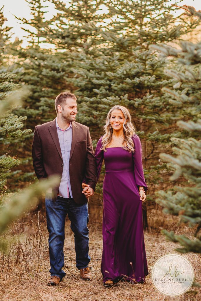 Husband and Wife Couples Photography Session at tree farm near Rochester, NY, in LeRoy at McPherson Orchards tree farm.