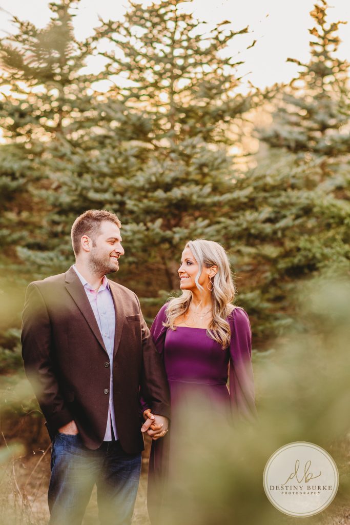 Husband and Wife Couples Photography Session at tree farm near Rochester, NY, in LeRoy at McPherson Orchards tree farm.