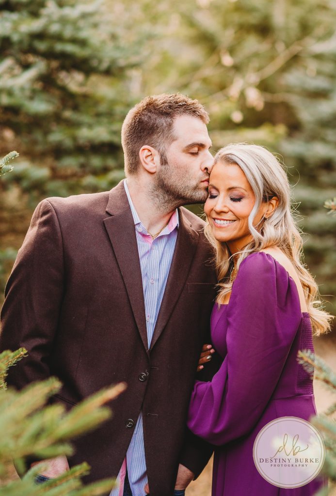 Husband and Wife Couples Photography Session at tree farm near Rochester, NY, in LeRoy at McPherson Orchards tree farm.