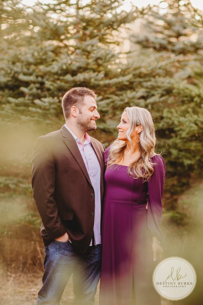 Husband and Wife Couples Photography Session at tree farm near Rochester, NY, in LeRoy at McPherson Orchards tree farm.