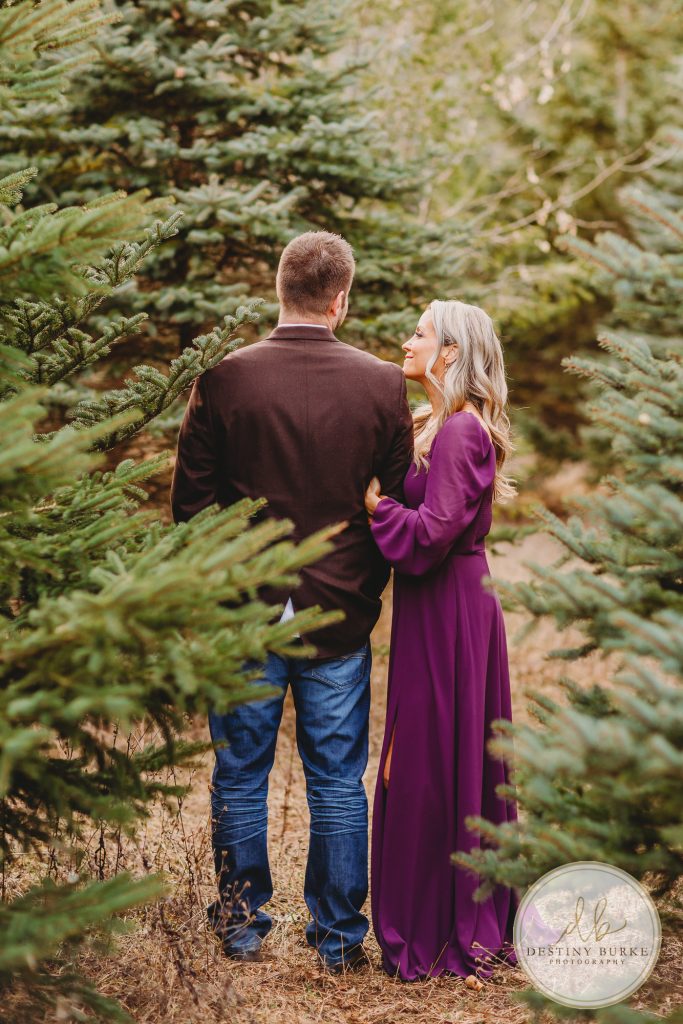 Husband and Wife Couples Photography Session at tree farm near Rochester, NY, in LeRoy at McPherson Orchards tree farm.