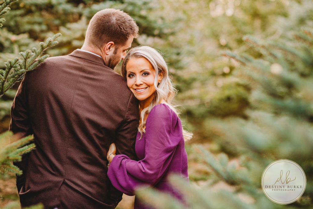 Husband and Wife Couples Anniversary Photography Session at tree farm near Rochester, NY, in LeRoy at McPherson Orchards tree farm.