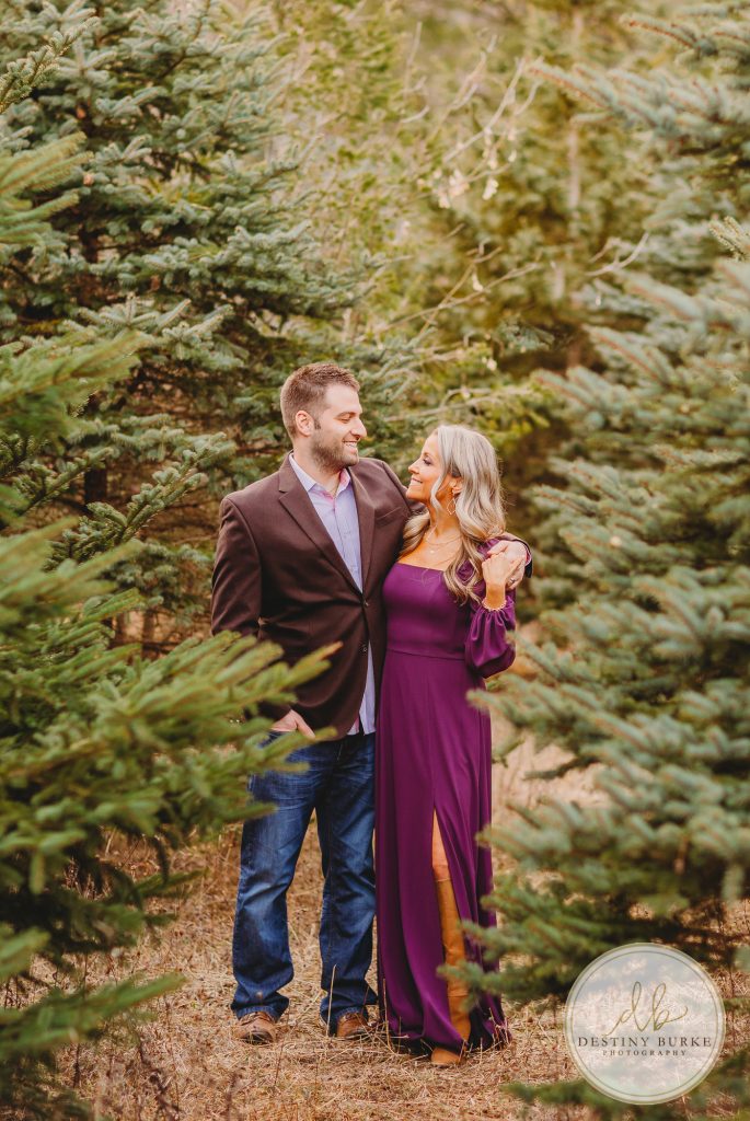 Husband and Wife Couples Anniversary Photography Session at tree farm near Rochester, NY, in LeRoy at McPherson Orchards tree farm.