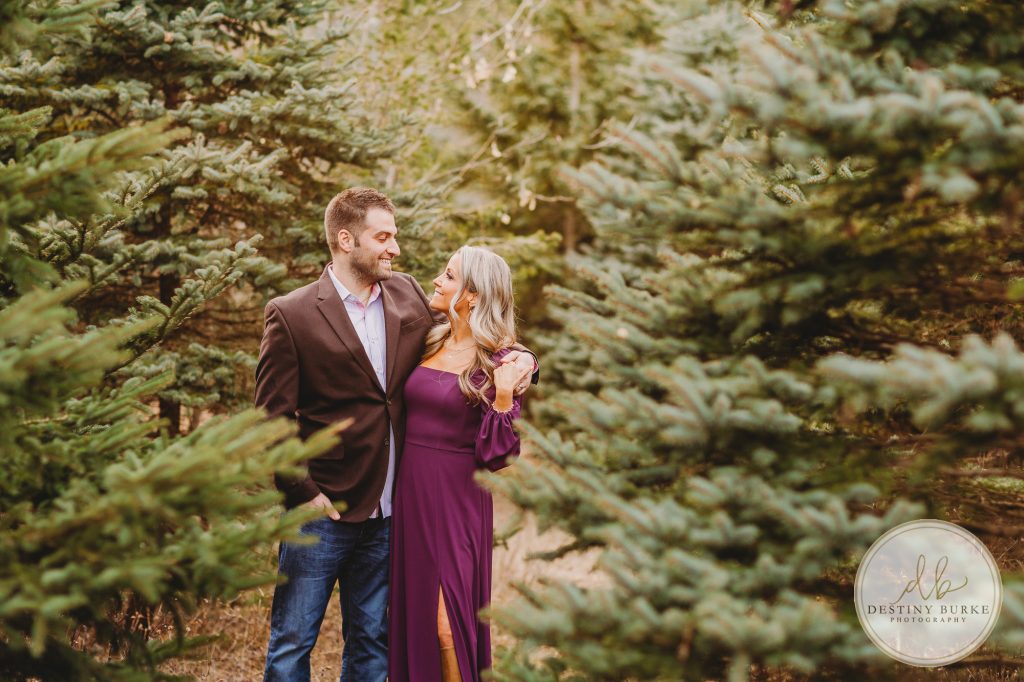 Husband and Wife Couples Anniversary Photography Session at tree farm near Rochester, NY, in LeRoy at McPherson Orchards tree farm.