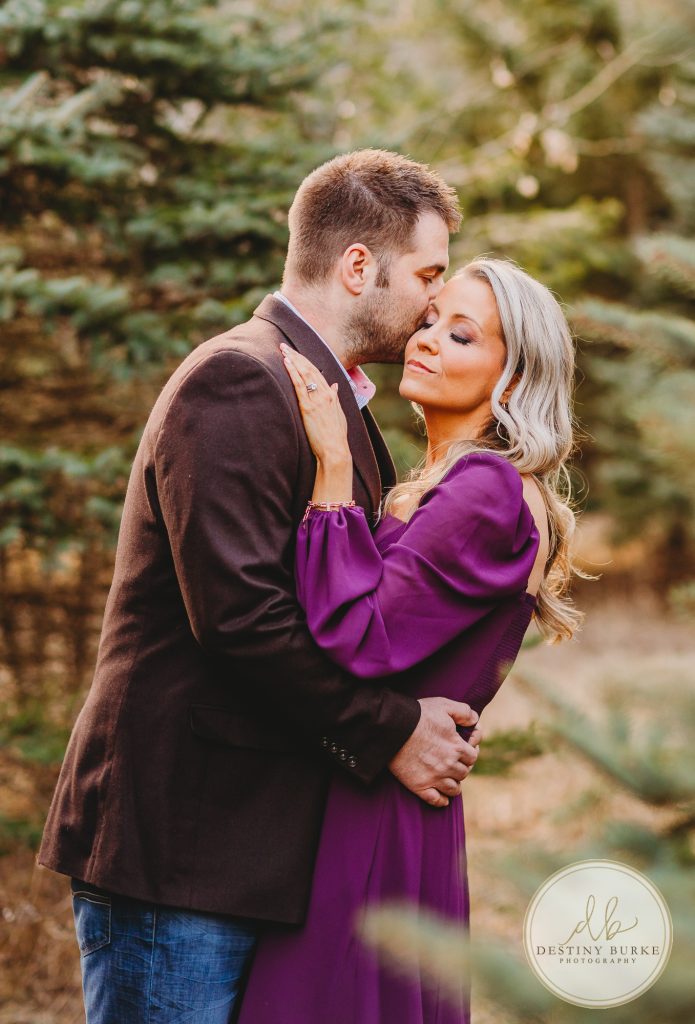 Husband and Wife Couples Anniversary Photography Session at tree farm near Rochester, NY, in LeRoy at McPherson Orchards tree farm.