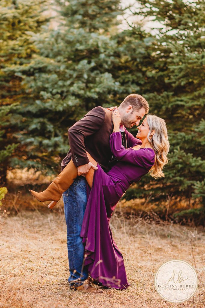 Husband and Wife Couples Anniversary Photography Session at tree farm near Rochester, NY, in LeRoy at McPherson Orchards tree farm.