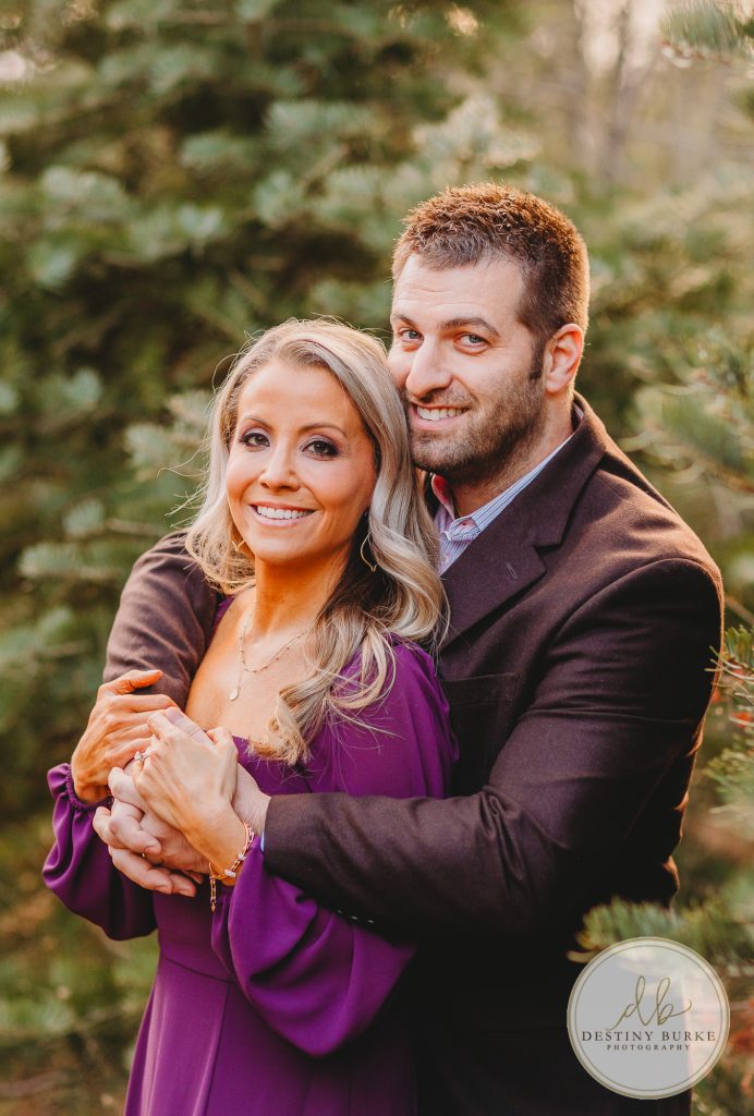 Husband and Wife Couples Anniversary Photography Session at tree farm near Rochester, NY, in LeRoy at McPherson Orchards tree farm.
