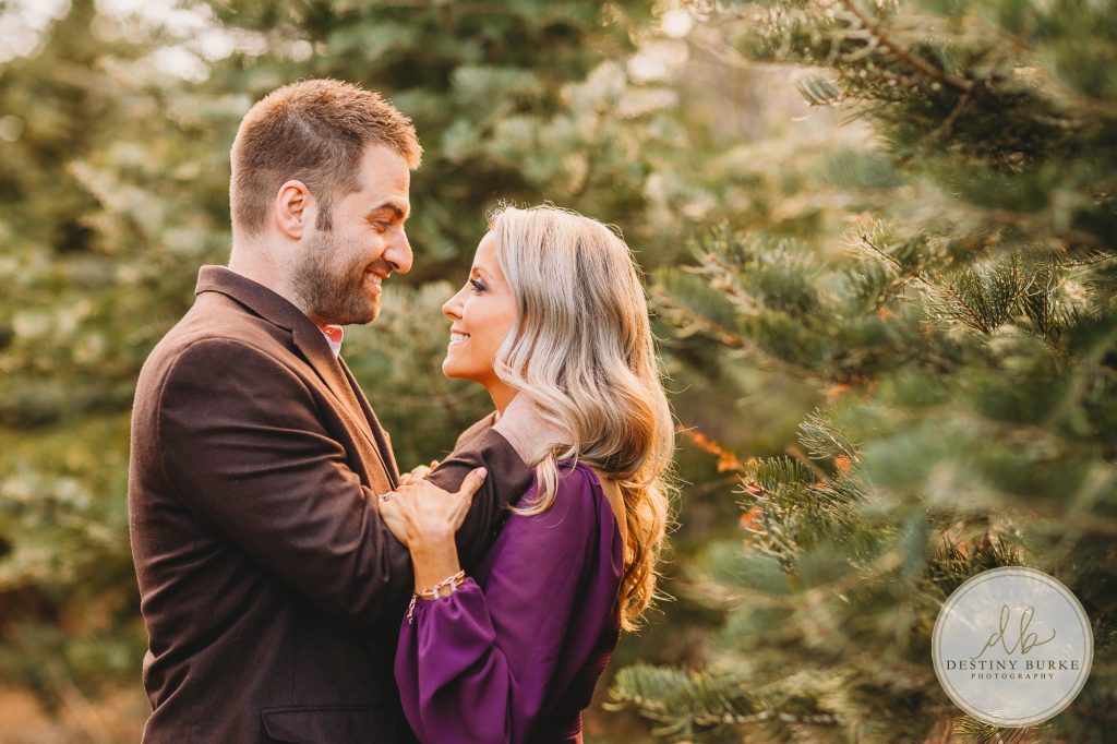 Husband and Wife Couples Anniversary Photography Session at tree farm near Rochester, NY, in LeRoy at McPherson Orchards tree farm.