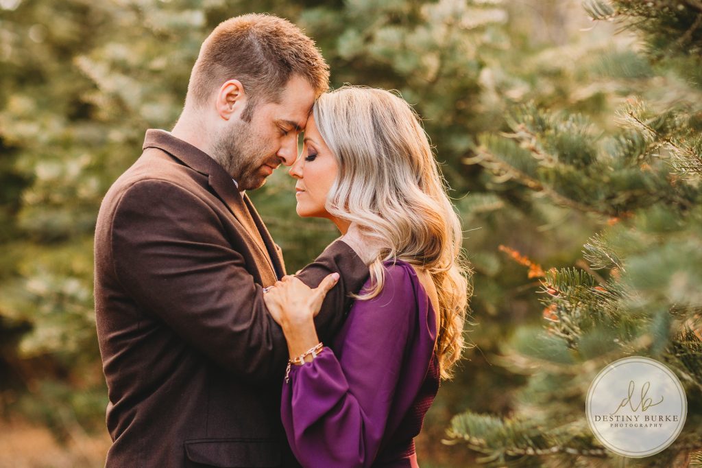 Husband and Wife Couples Anniversary Photography Session at tree farm near Rochester, NY, in LeRoy at McPherson Orchards tree farm.