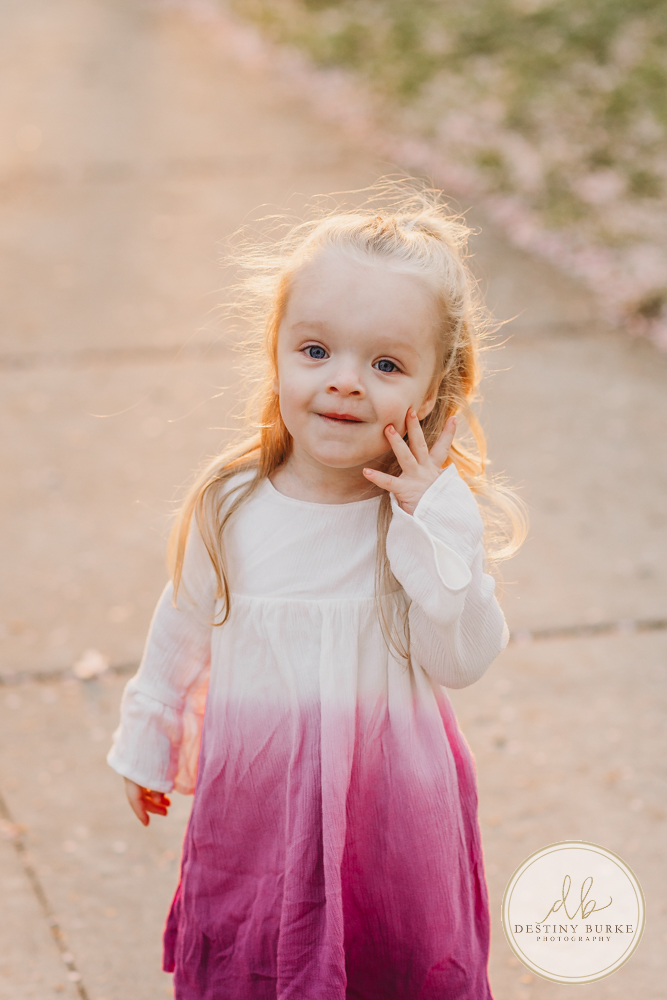best family photographer near Rochester, NY, at Highland Park, family of 5 under the Cherry Blossom trees, photographed by Destiny Burke Photography.