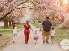 best family photographer near Rochester, NY, at Highland Park, family of 5 under the Cherry Blossom trees, photographed by Destiny Burke Photography.