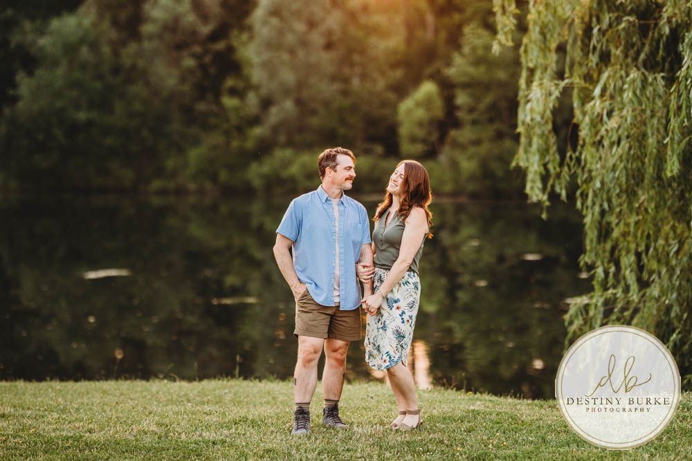 Generational family portrait of the Landry Family captured outdoors in Upstate NY with natural golden light and heartfelt connection, by Rochester photographer Destiny Burke.