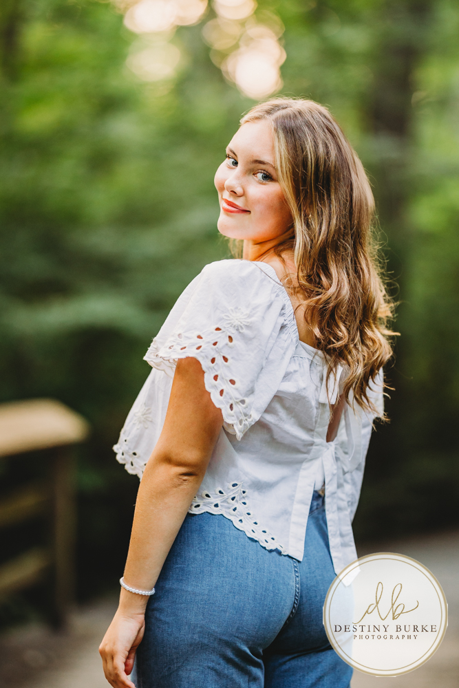 Natural Light Senior Photo of Sienna Laughing During Sunset Senior Portrait Session in Upstate New York, Rochester, Pittsford.