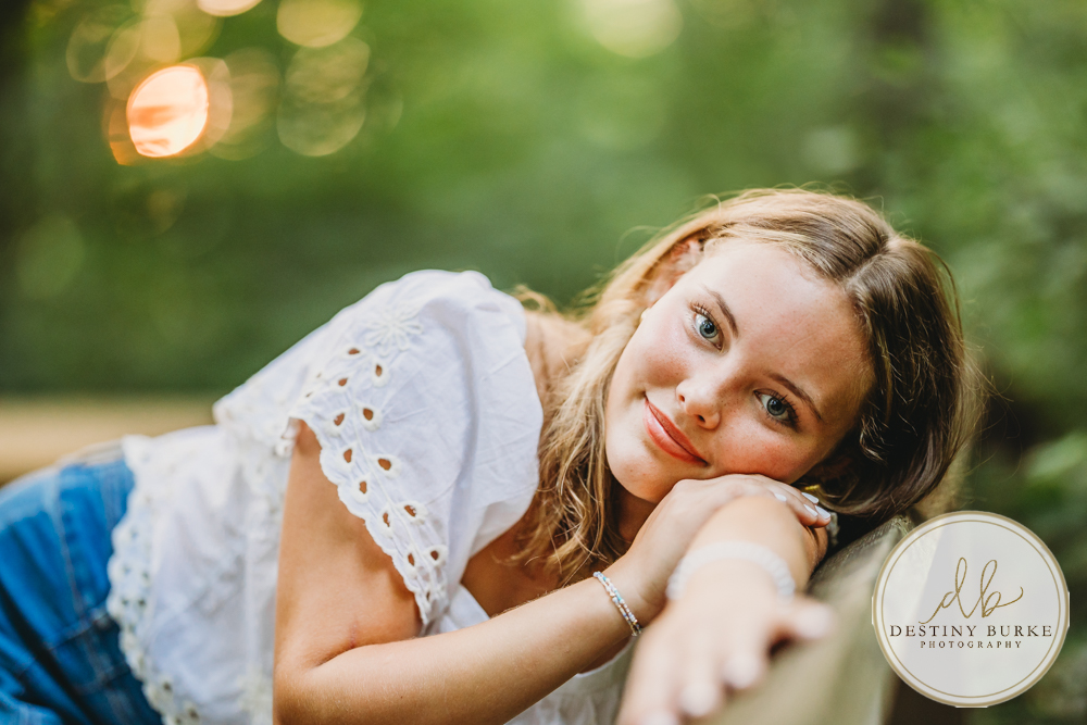 Natural Light Senior Photo of Sienna Laughing During Sunset Senior Portrait Session in Upstate New York, Rochester, Pittsford.
