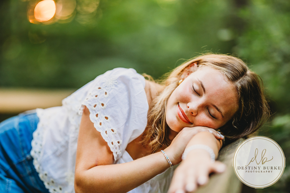 Natural Light Senior Photo of Sienna Laughing During Sunset Senior Portrait Session in Upstate New York, Rochester, Pittsford.