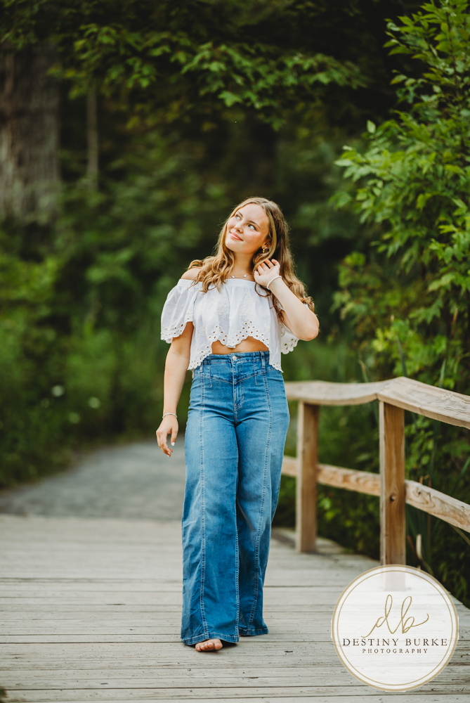 Natural Light Senior Photo of Sienna Laughing During Sunset Senior Portrait Session in Upstate New York, Rochester, Pittsford.