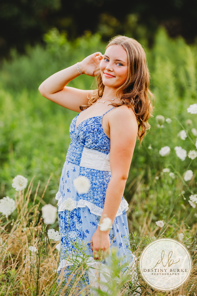 Natural Light Senior Photo of Sienna Laughing During Sunset Senior Portrait Session in Upstate New York, Rochester, Pittsford.