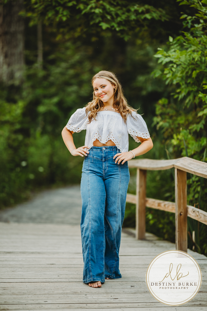 Natural Light Senior Photo of Sienna Laughing During Sunset Senior Portrait Session in Upstate New York, Rochester, Pittsford.