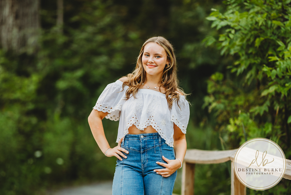 Natural Light Senior Photo of Sienna Laughing During Sunset Senior Portrait Session in Upstate New York, Rochester, Pittsford.