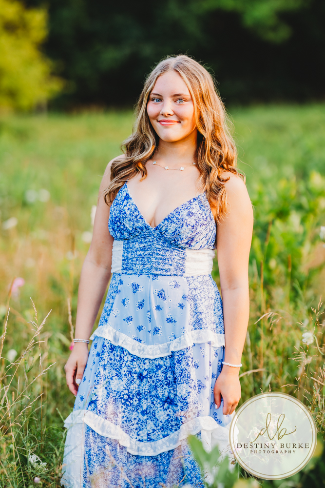 Natural Light Senior Photo of Sienna Laughing During Sunset Senior Portrait Session in Upstate New York, Rochester, Pittsford.