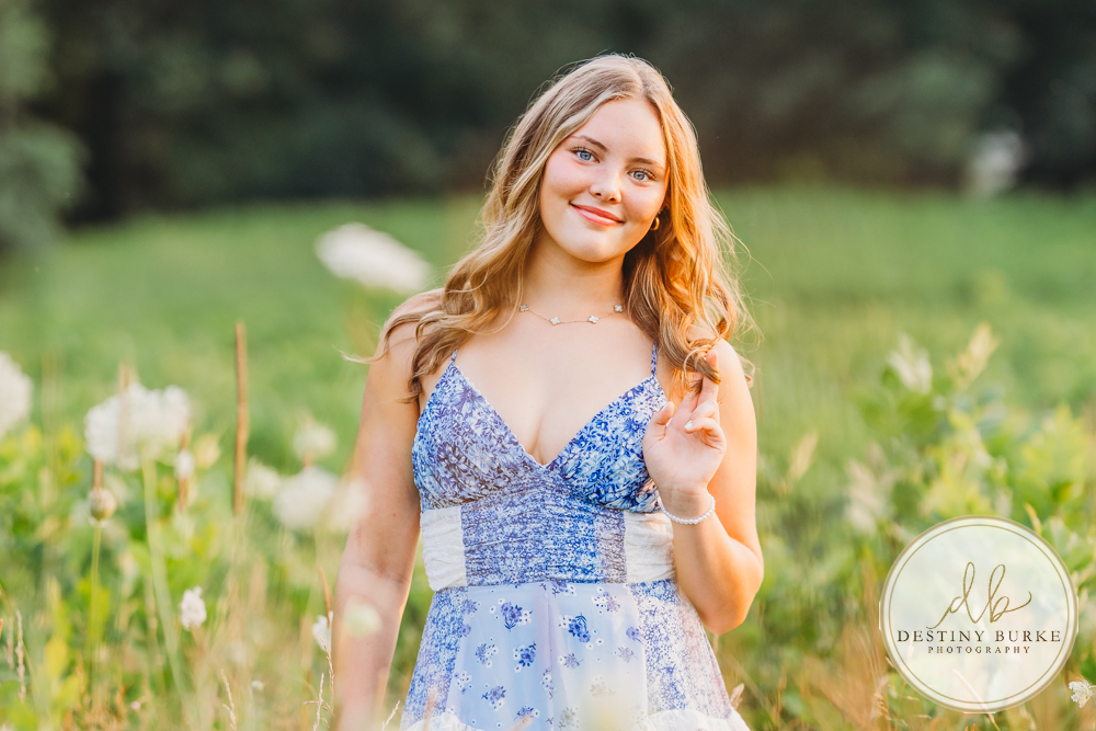 Natural Light Senior Photo of Sienna Laughing During Sunset Senior Portrait Session in Upstate New York, Rochester, Pittsford.