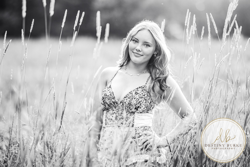 Natural Light Senior Photo of Sienna Laughing During Sunset Senior Portrait Session in Upstate New York, Rochester, Pittsford.